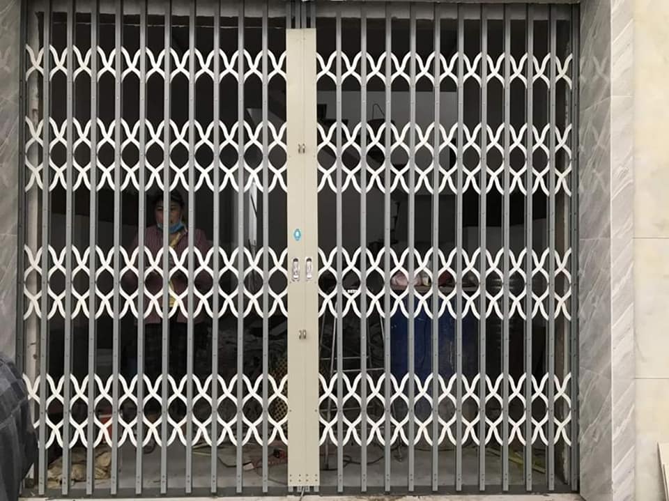 phụ kiện cửa sắt kéo